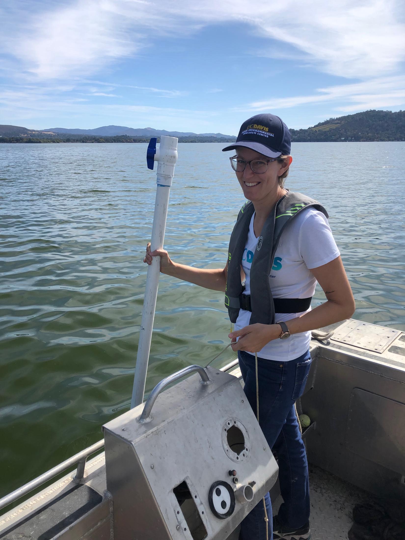 Photo of woman wearing a hat on boat