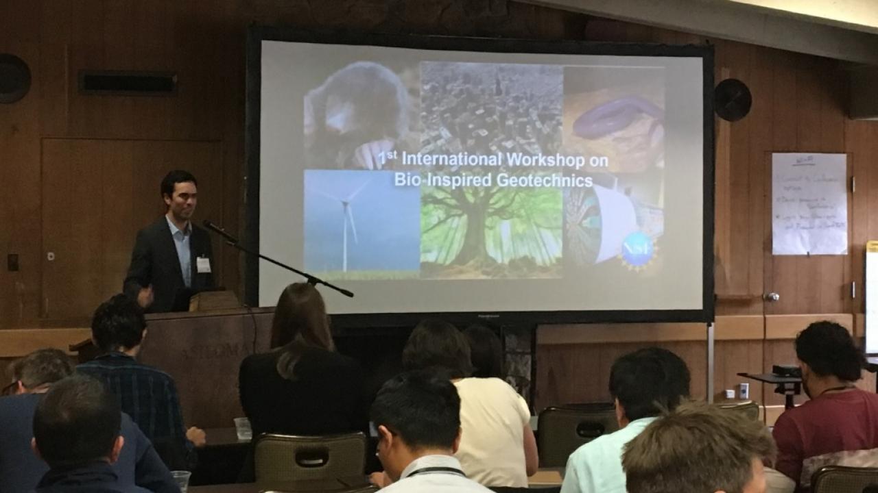 UC Davis civil and environmental engineering assistant professor Alejandro Martinez gives opening remarks at the First International Workshop on Bio-Inspired Geotechnics on May 19, 2019. Photo: Noah Pflueger-Peters/UC Davis. Geotech Conference