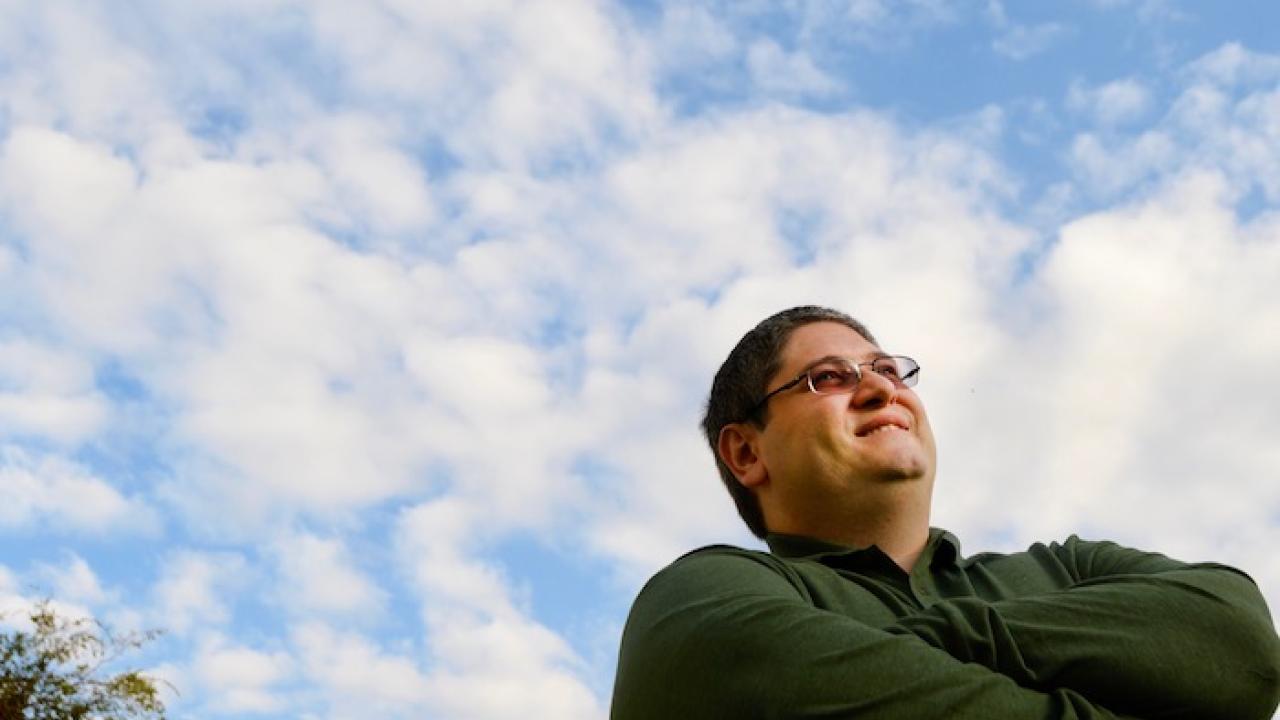 Photo of Michele Barbato with a cloudy sky in the background